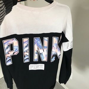 Long sleeve, pink shirt.